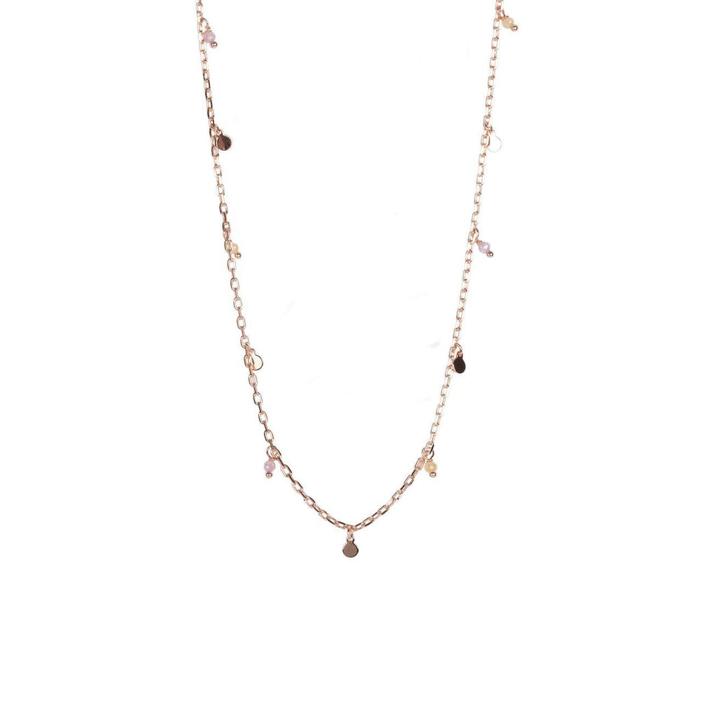 2. MyaMoon Helena Choker in rose gold with small pearls and beads, shown in a studio setting