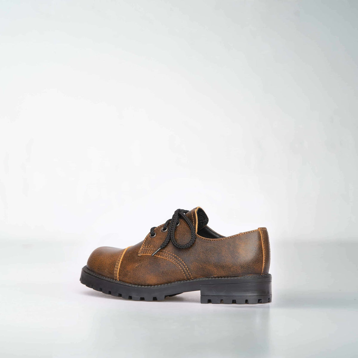 2. Side view of unisex light brown Samelin Widgets, highlighting genuine leather upper and durable outsole