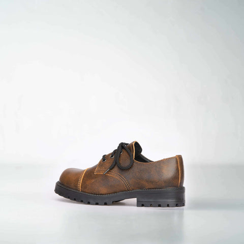 2. Side view of unisex light brown Samelin Widgets, highlighting genuine leather upper and durable outsole