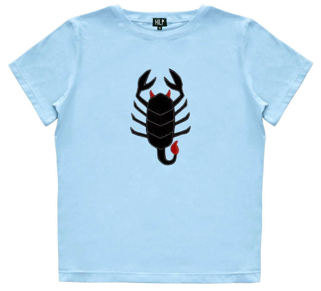 3. Women's Scorpio T-shirt by HILP in light blue, with a black scorpion design, studio shot