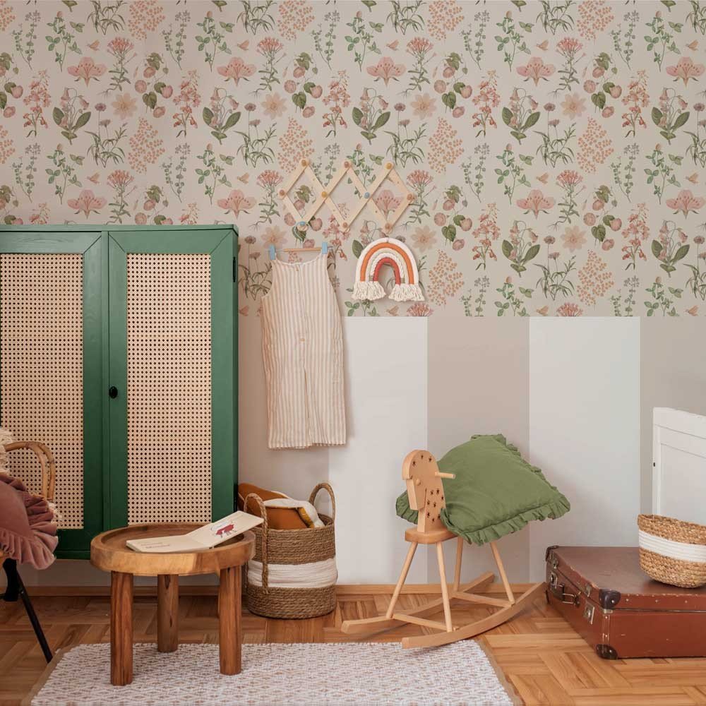 1. Room with Dekornik floral wallpaper in pastel tones, featuring a green cabinet, wooden toys, and a cozy decor setting