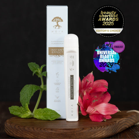 3. HOIA Instant Effect Super-Firming Eye Serum with awards and mint and flower decoration