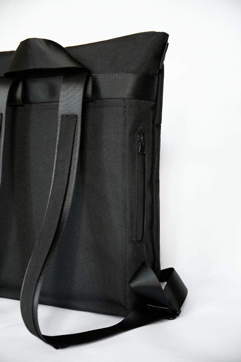 9. Studio shot of Nordhale HØLAR Weatherproof Backpack front view, showcasing minimalist design