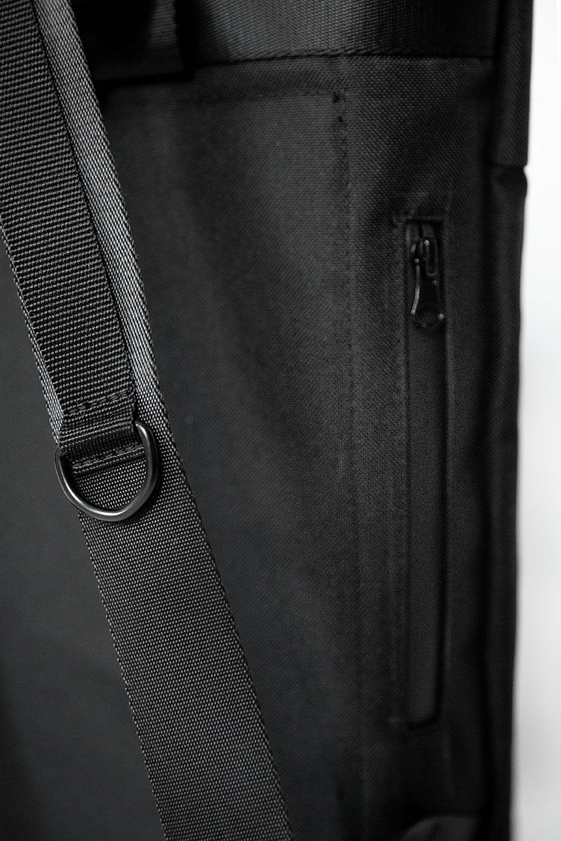 11. Close-up of Nordhale HØLAR Weatherproof Backpack side zipper pocket and D-loop for keys