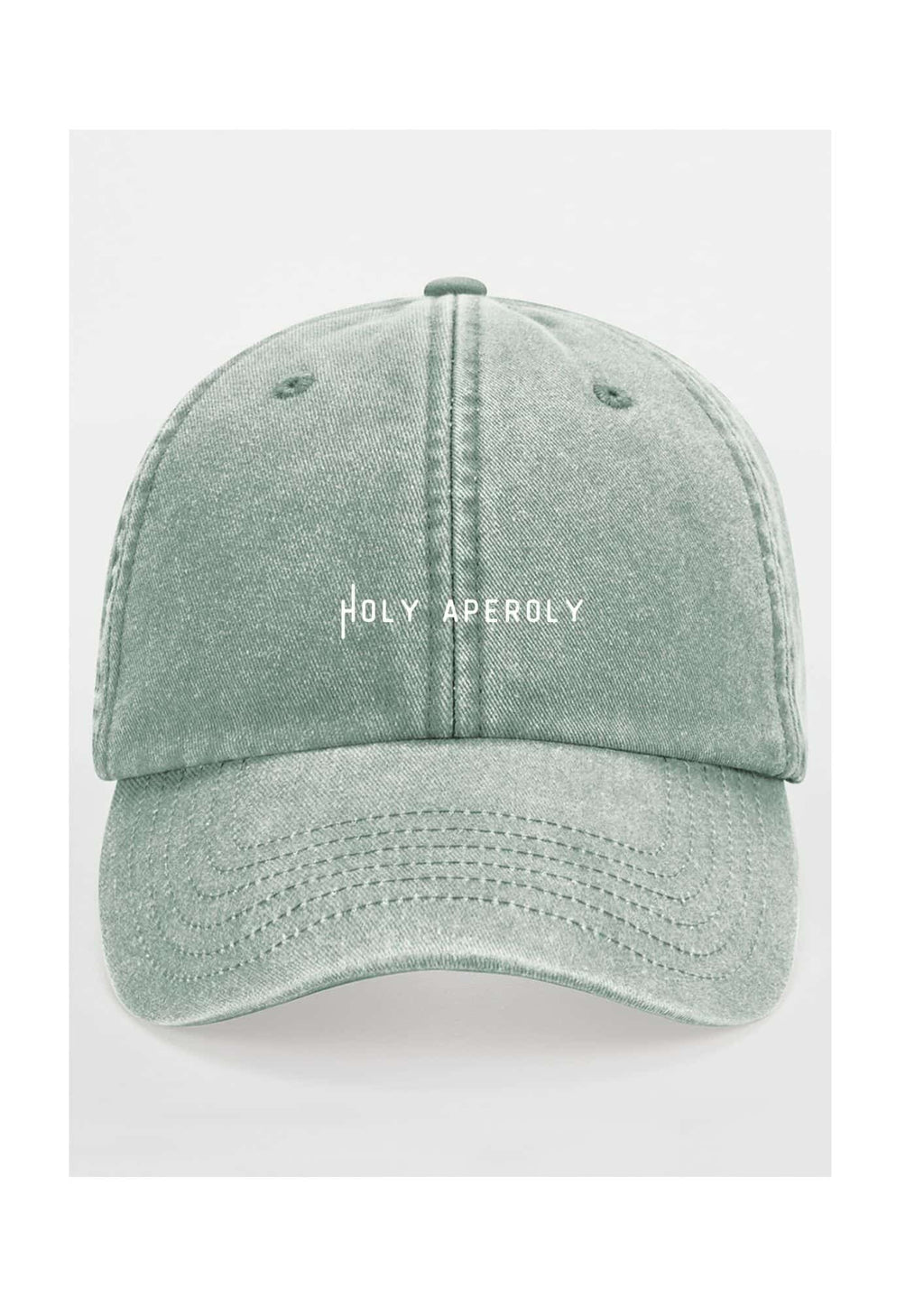 3. Studio shot of pastel green Holy Aperoly cap by Black Giraffe Brand with white logo on front