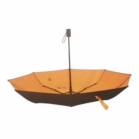 2. Honeycomb pattern interior of Honey Umbrella, open view, highlighting vibrant design and automatic feature