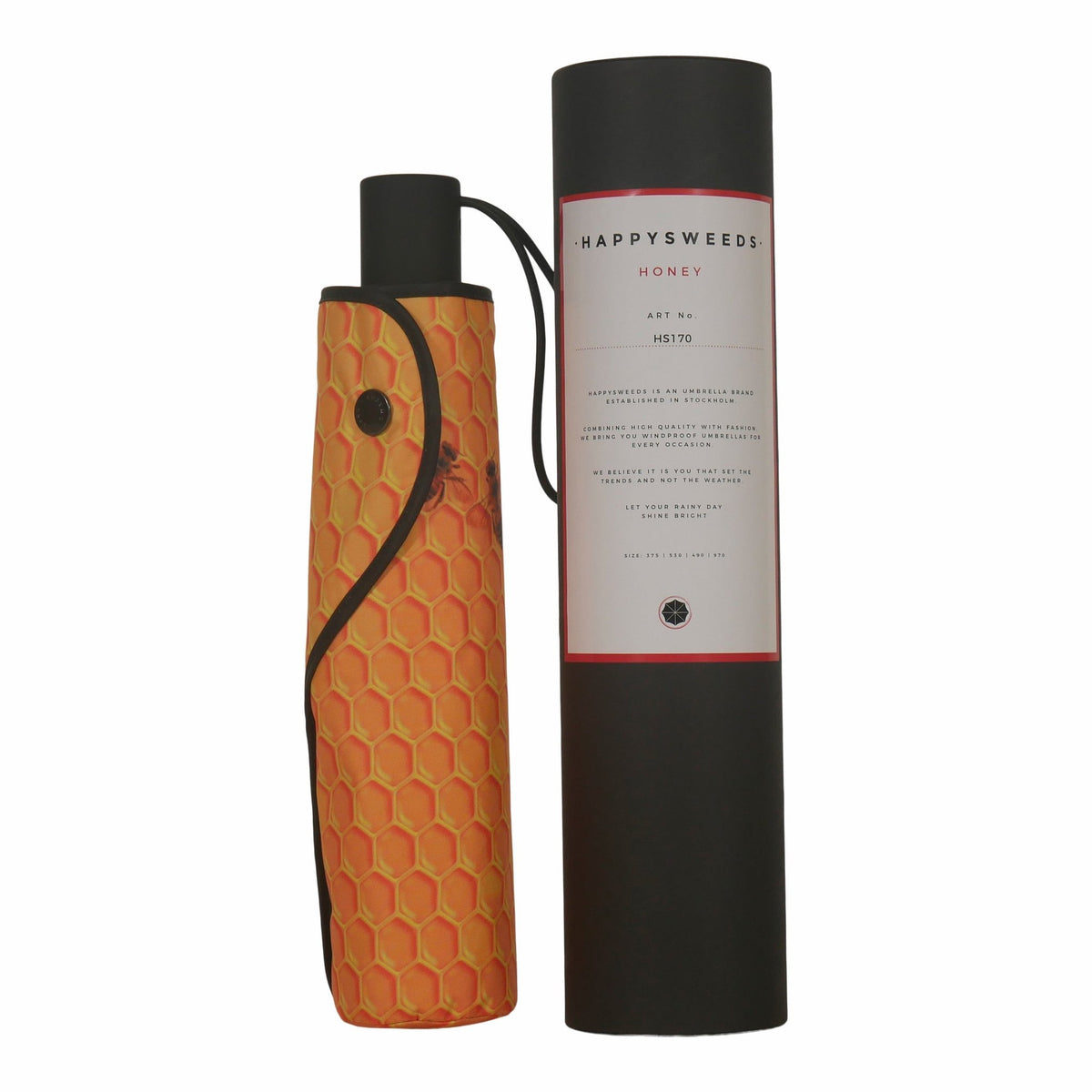 4. Honey Umbrella in honeycomb pattern with branded packaging, showcasing compact and stylish design