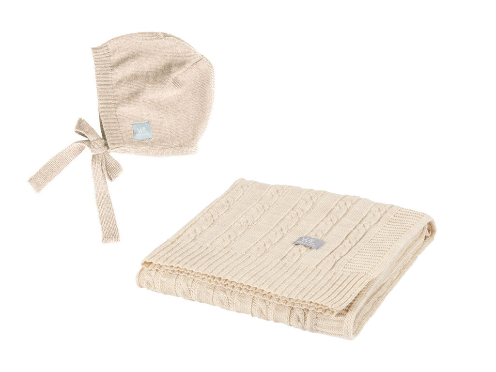3. Beige cable knit baby blanket and bonnet set with ties on white background
