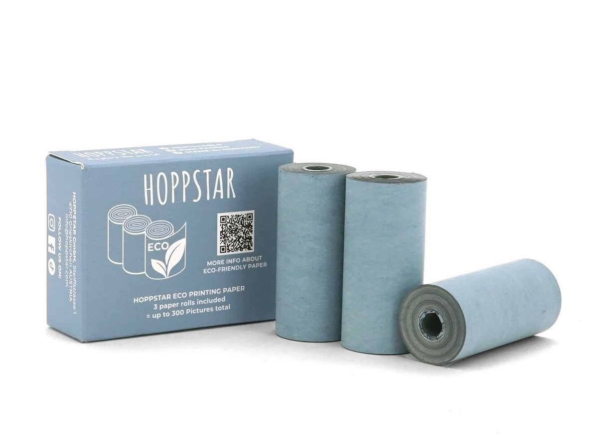 1. Hoppstar Eco paper rolls with blue packaging and three rolls standing upright on a white background