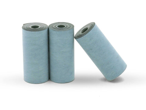 2. Three Hoppstar Eco paper rolls standing on a white surface, showcasing the eco-friendly thermal paper