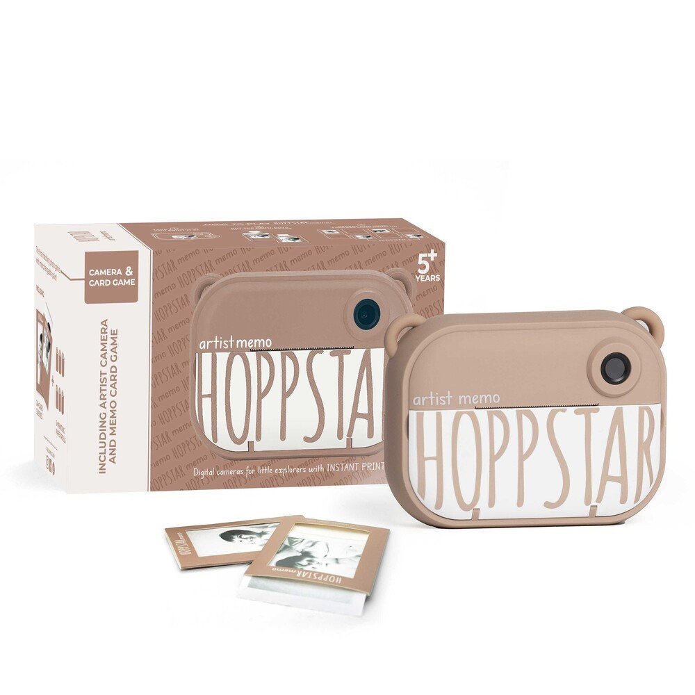 2. Hoppstar Artist Memo camera with packaging and memory game cards on white background