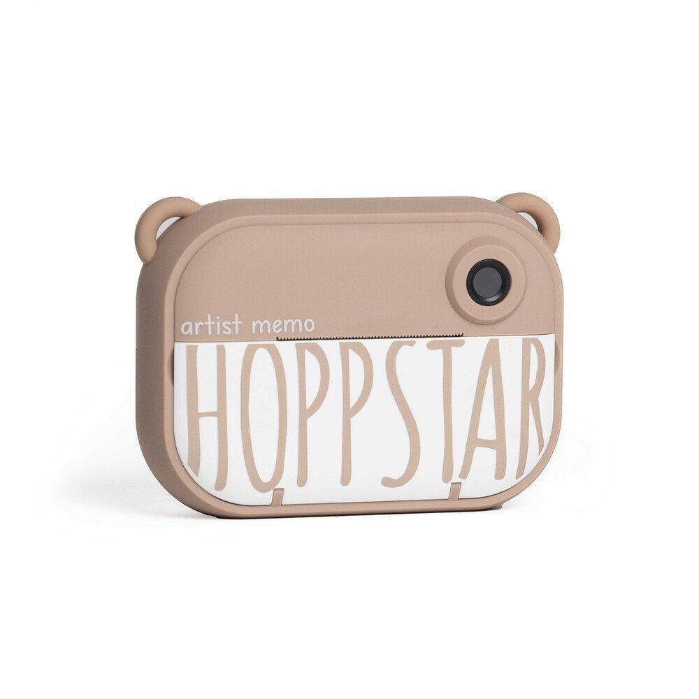 2. Almond-colored Hoppstar Artist Memo camera with logo on white background