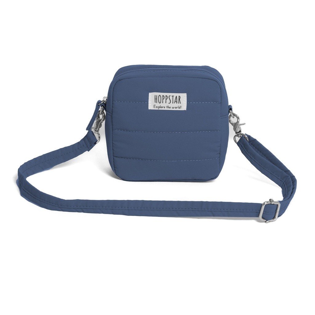 12. Navy Hoppstar camera bag with adjustable strap and logo, shown on white background