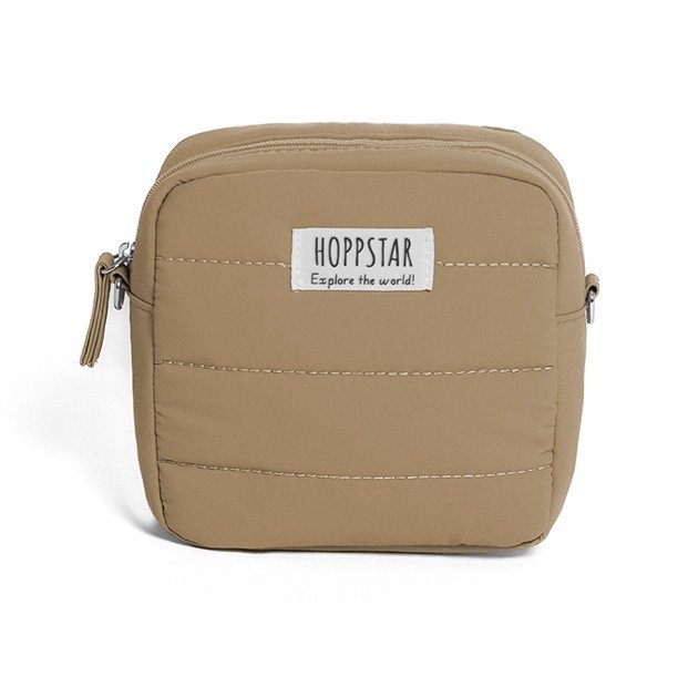 5. Beige Hoppstar camera bag with logo, shown on white background