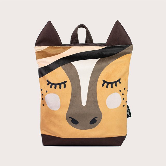 5. Studio image of Muni horse backpack, featuring playful horse face design