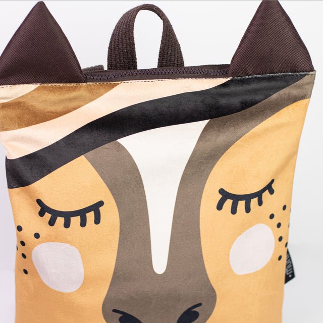 7. Close-up of Muni horse backpack, focusing on horse face design and fabric texture