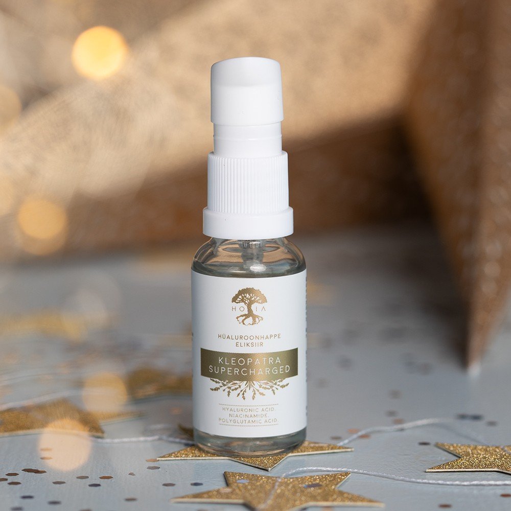 2. HOIA homespa Hyaluronic Acid Elixir Kleopatra SUPERCHARGED bottle on decorative surface