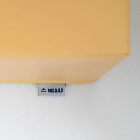 5. Close-up of IGLU logo tag on yellow foam block