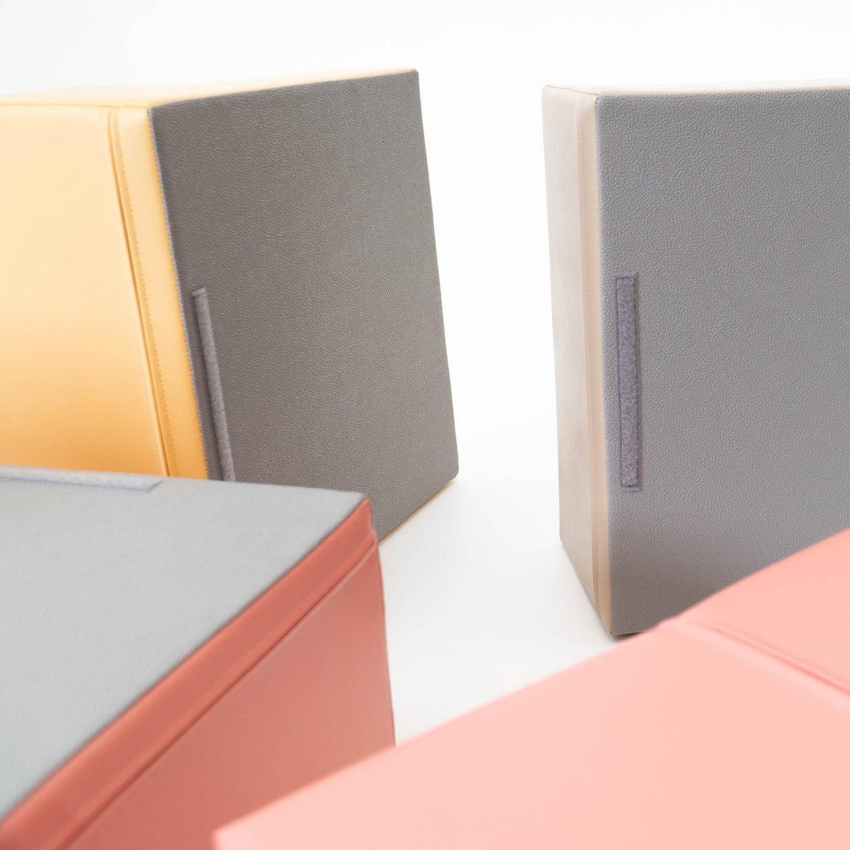 8. Close-up of IGLU Adventurer pastel pink and grey foam blocks with velcro strips