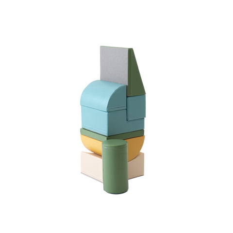 2. Side view of IGLU Adventurer foam blocks stacked in pastel colors on a white background