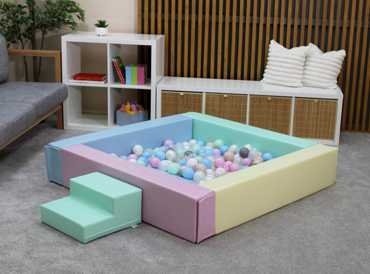 2. IGLU light pastel foam ball pit with pastel balls in modern indoor playroom setting