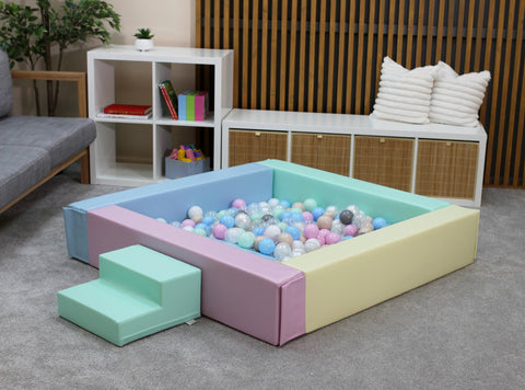 2. IGLU light pastel foam ball pit with pastel balls in modern indoor playroom setting