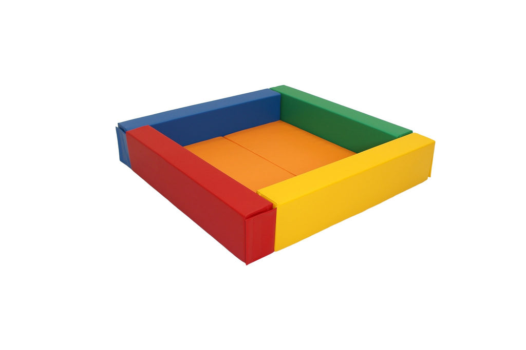 6. Angled view of empty multicolor IGLU soft play ball pit with vibrant colors