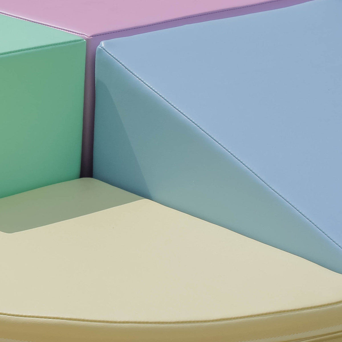 16. Close-up of IGLU pastel foam blocks showing texture and color detail