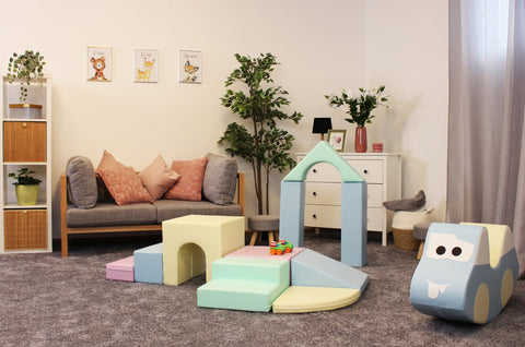 1. Pastel foam block set in a cozy living room setting with sofa and plants, ideal for children's play