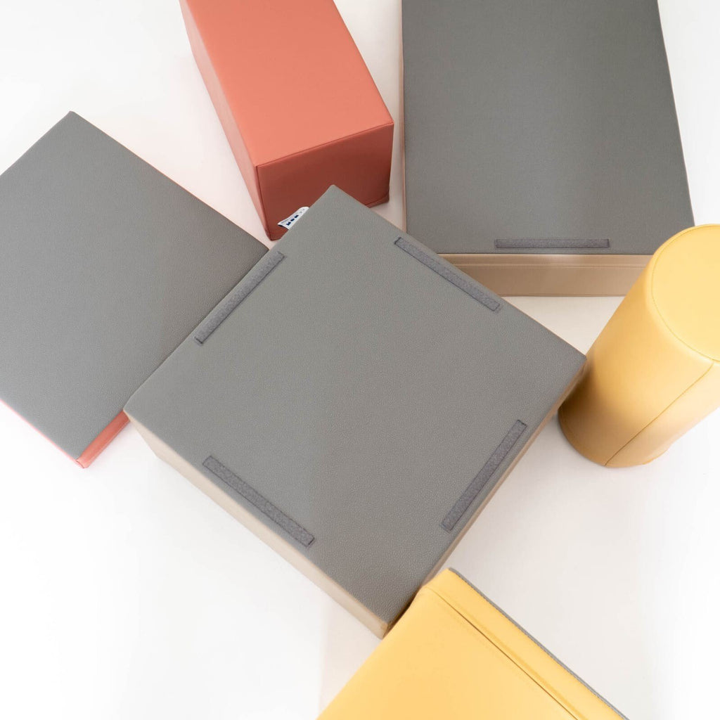 4. Flat lay of IGLU Discoverer 7-piece pastel pink foam block set showing individual block shapes