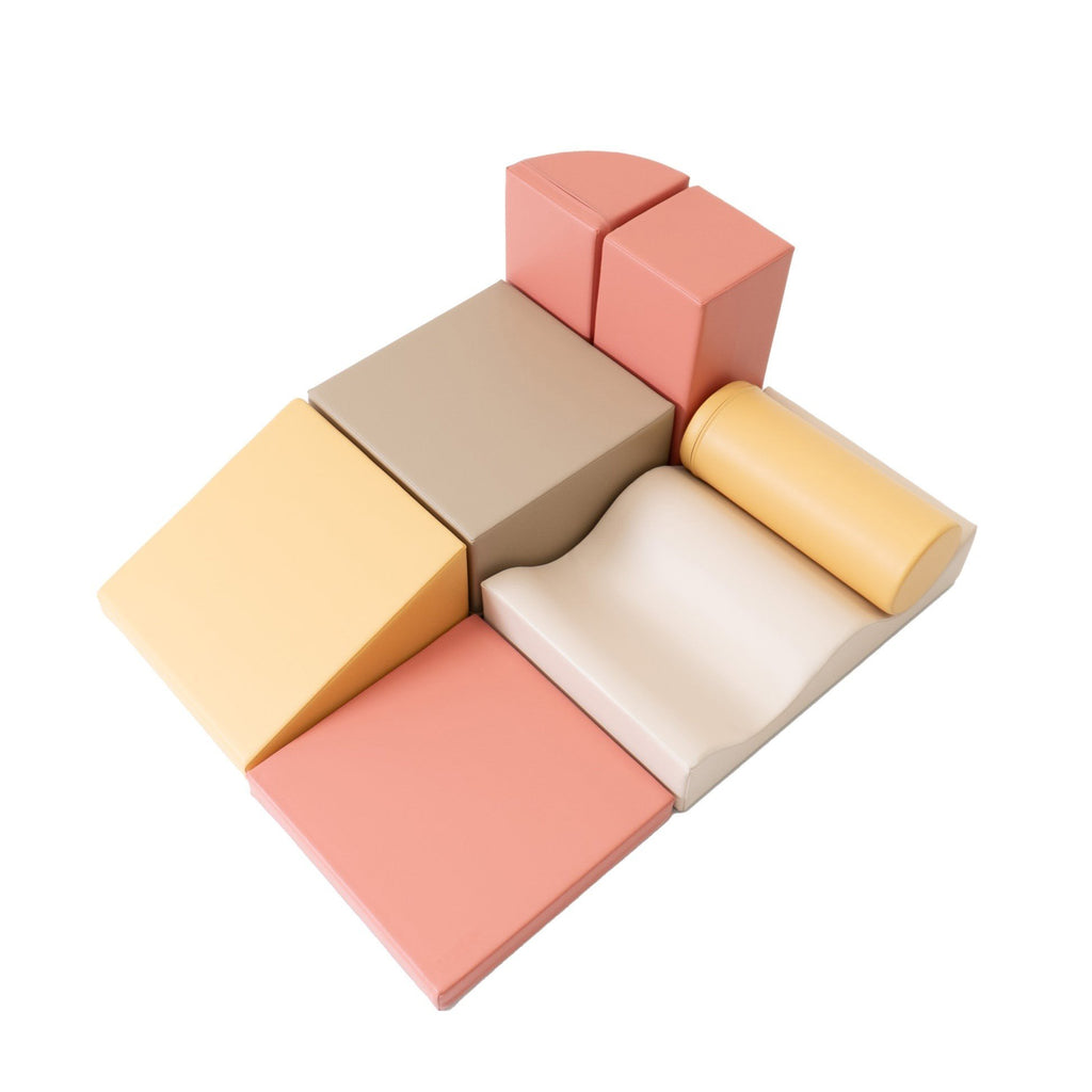 2. Top view of IGLU Discoverer 7-piece pastel pink foam block set arranged in a square layout