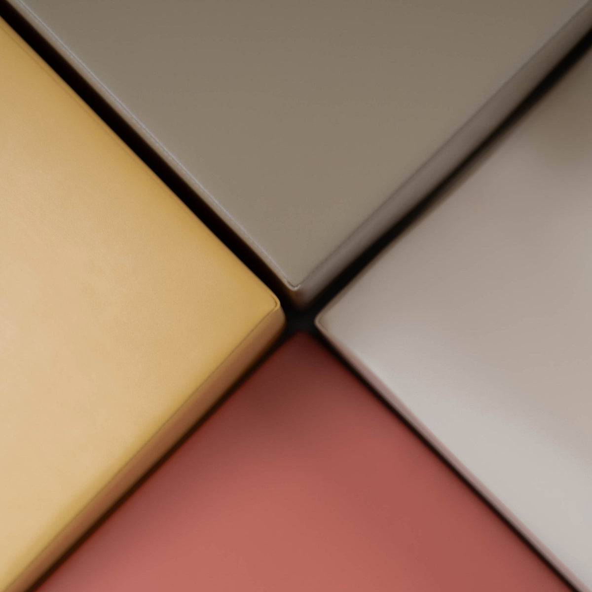 3. Close-up of pastel pink, yellow, and beige foam block corners showing texture and color contrast