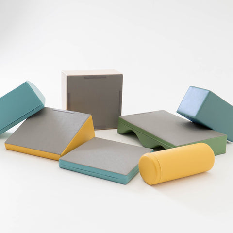5. IGLU Discoverer foam blocks in pastel colors arranged in a casual layout on a white background