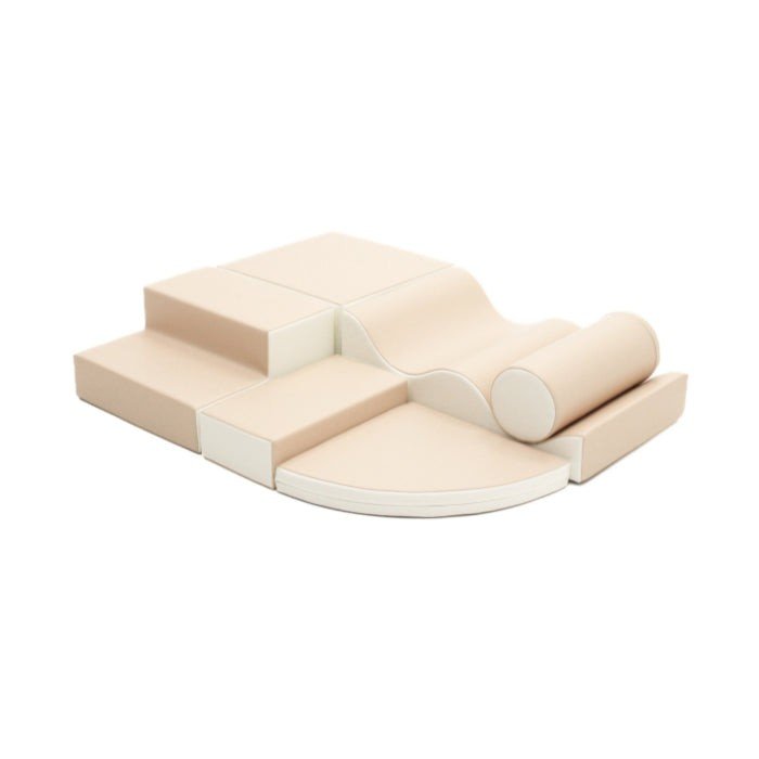 2. Beige soft play foam block set with various shapes including ramps and corners on a white background