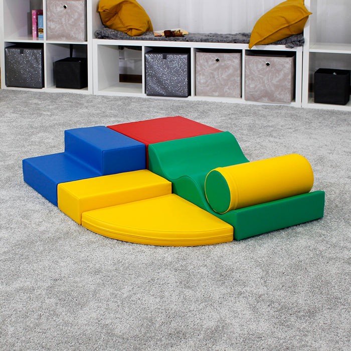 2. Multicolor foam block set arranged on grey carpet in playroom