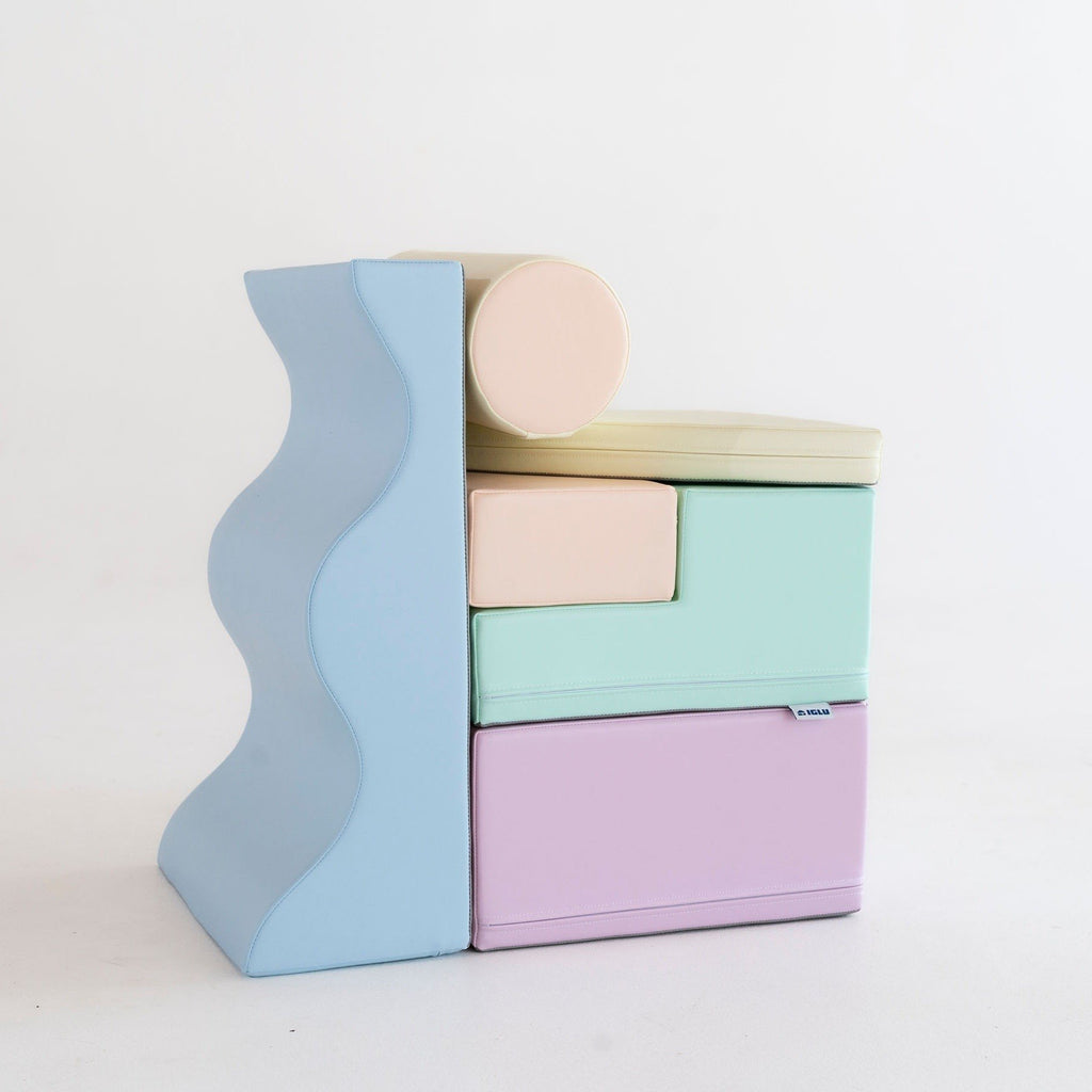 2. Stacked pastel foam blocks on a white background