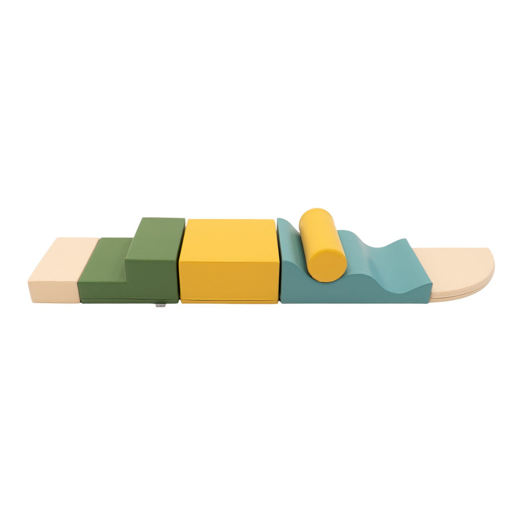 6. Side view of IGLU Explorer Set with pastel turquoise, yellow, and green foam blocks arranged in a line