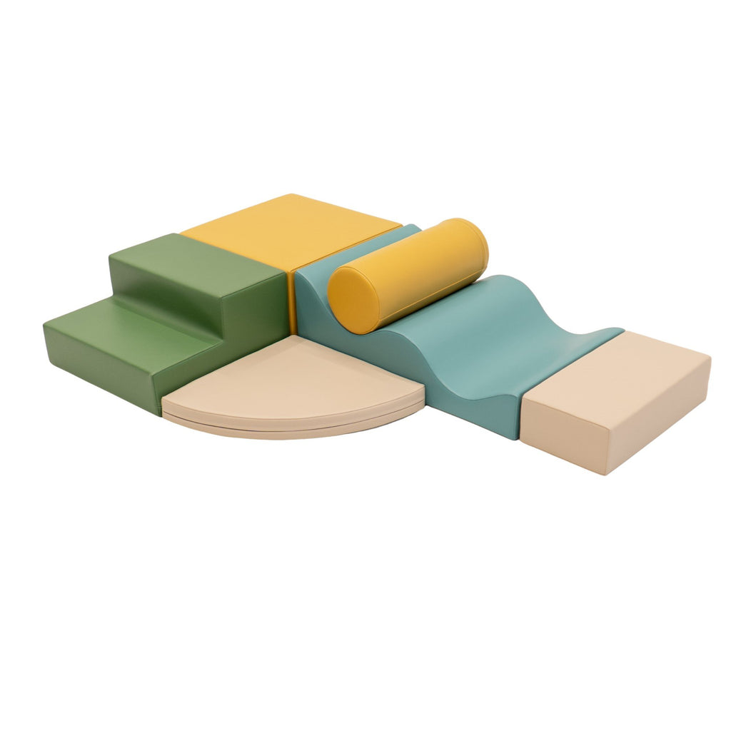 1. IGLU Explorer Set with pastel turquoise, yellow, and green foam blocks arranged in a play structure on a white background