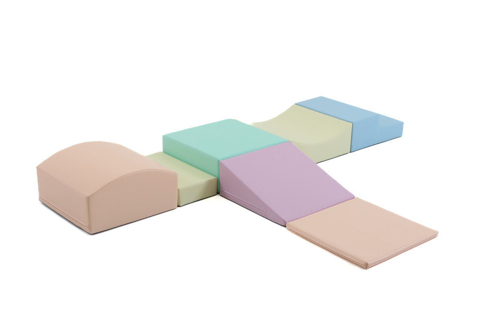 2. Studio shot of IGLU Little Crawler 7-piece foam block set in light pastel colors on white background