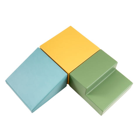 1. Flat lay of IGLU pastel turquoise, yellow, and green foam blocks arranged in a triangle shape