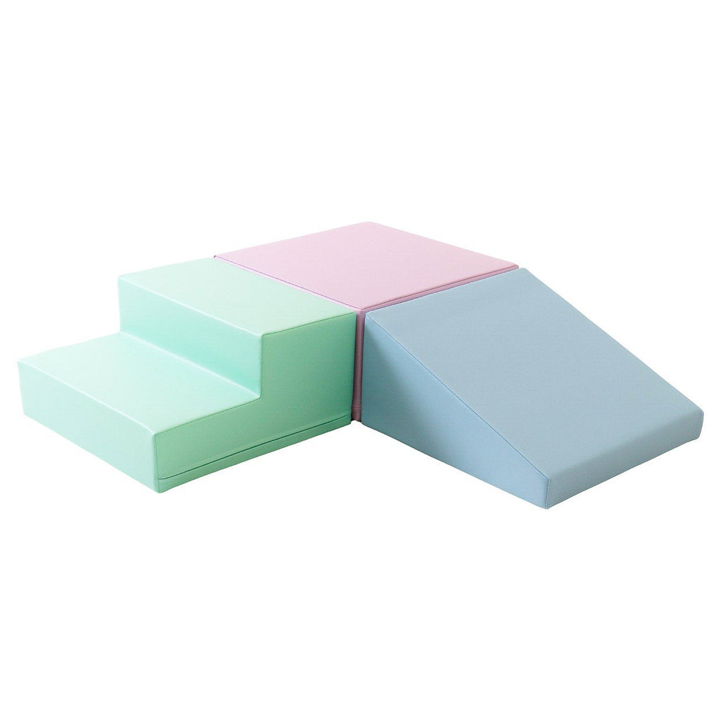 2. Soft pastel foam block set in pink, mint, and blue arranged in a step and slope design on a white background