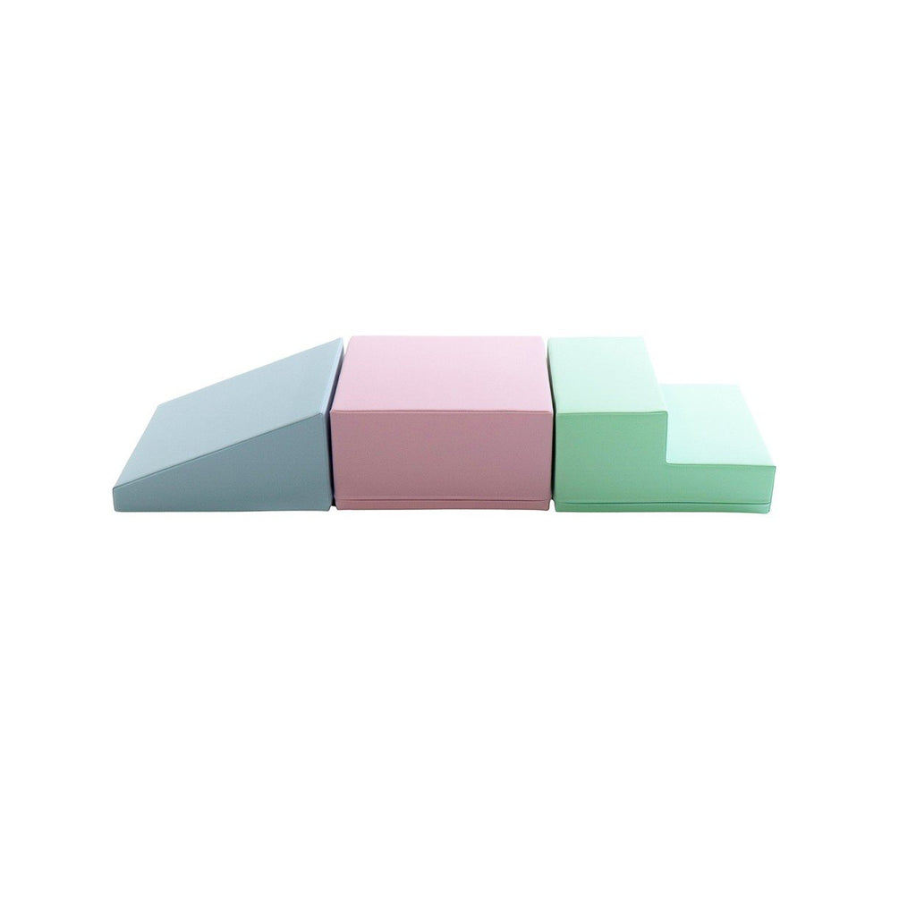 2. IGLU soft pastel foam blocks in a step and slope arrangement on a white background
