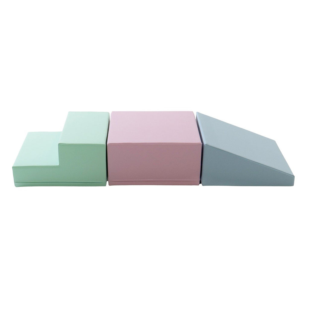 2. IGLU soft pastel foam blocks in a step and slope arrangement on a white background