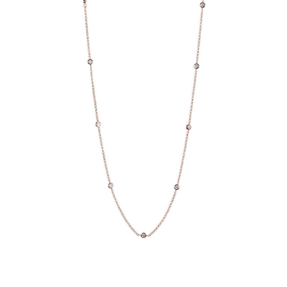 3. Studio image of Illumi Doubled S Necklace in rose gold, featuring minimalistic design with zircons