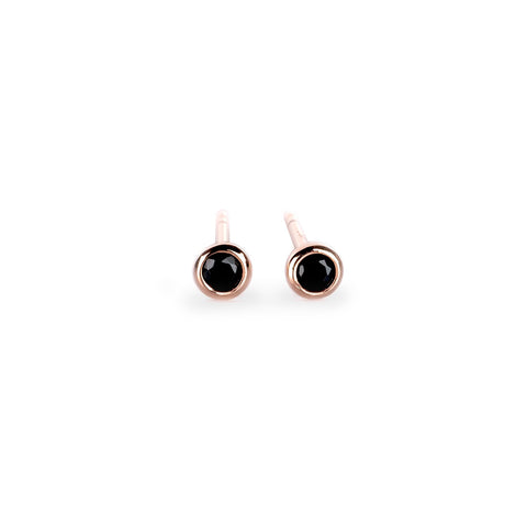 5. MyaMoon Illumi stud earrings in rose gold with black zircon, combining elegance with a modern edge