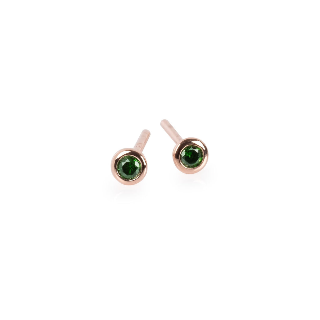 6. MyaMoon Illumi stud earrings in rose gold with green zircon, reflecting Nordic-inspired charm