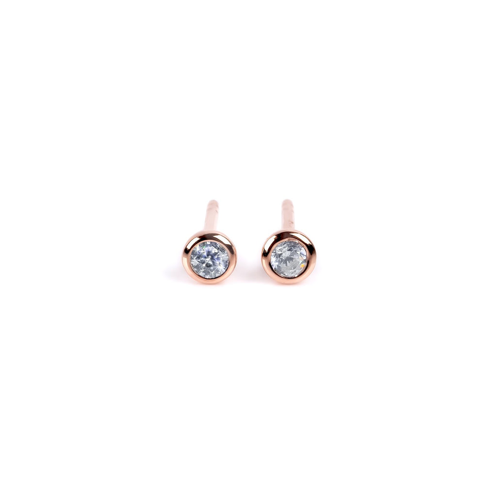 8. MyaMoon Illumi stud earrings in rose gold with white zircon, embodying minimalist sophistication