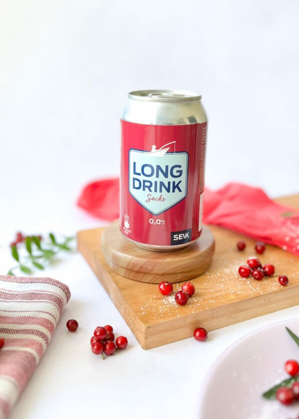 5. SEIK Long Drink Socks in cranberry with can, styled with cranberries and wooden board