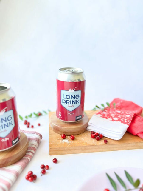 3. SEIK Long Drink Socks in cranberry with two cans, styled with cranberries and wooden board