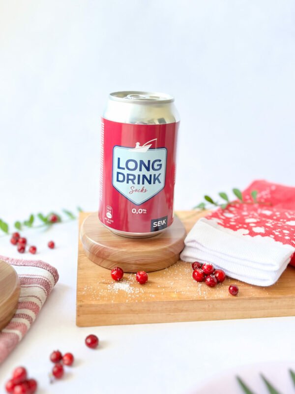1. SEIK Long Drink Socks in cranberry with can, styled with cranberries and wooden board